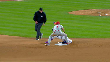Johan Rojas gets the runner after review