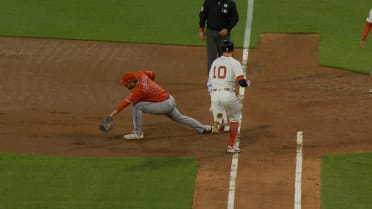 Trevor Story is out at first base after review